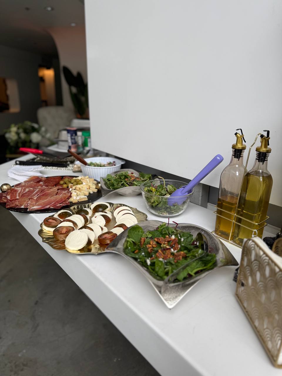 Appetizer spread with olive oils and salads on the lobby counter