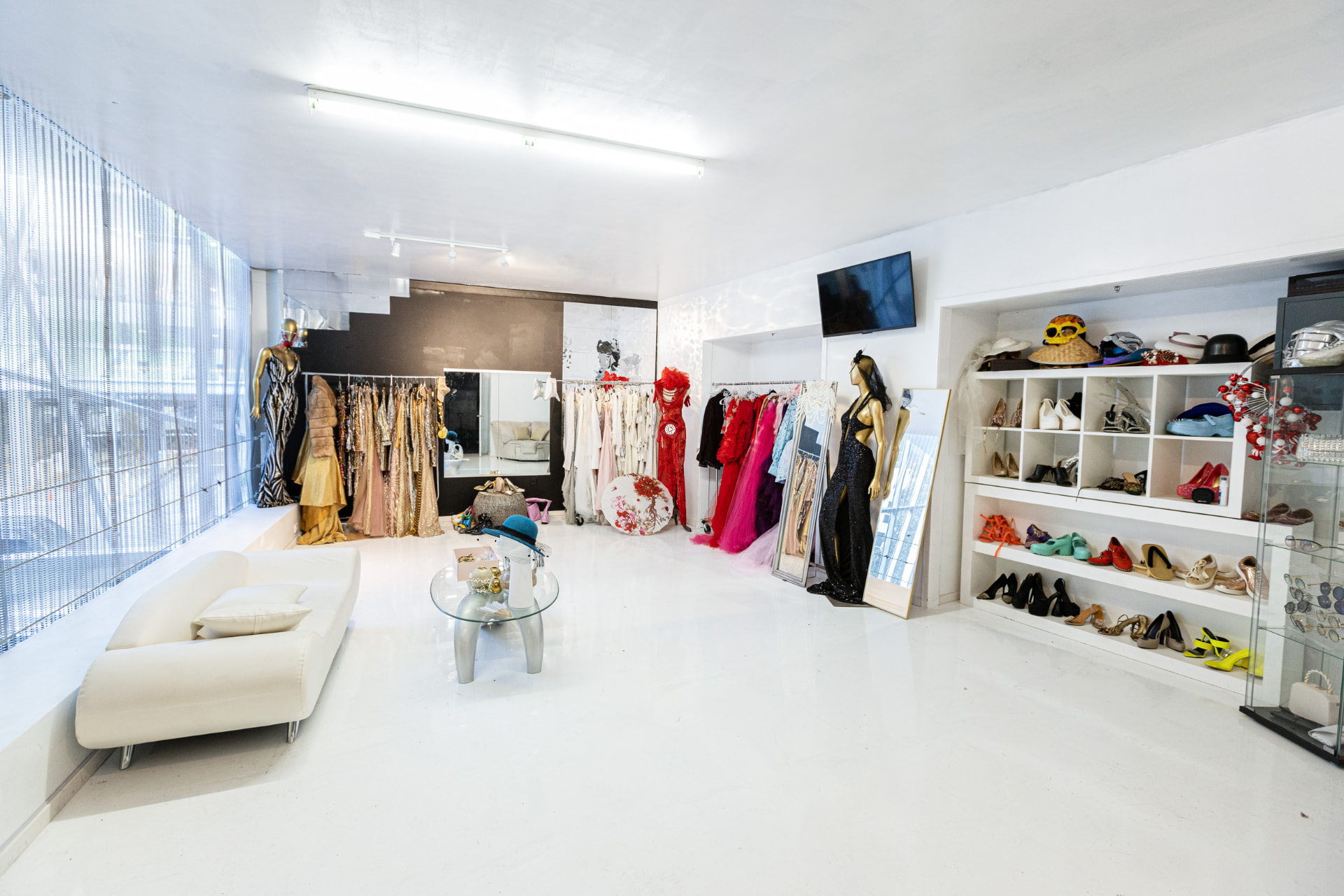 The bridal styling suite with gown racks, mirrors and shoe shelving in daylight